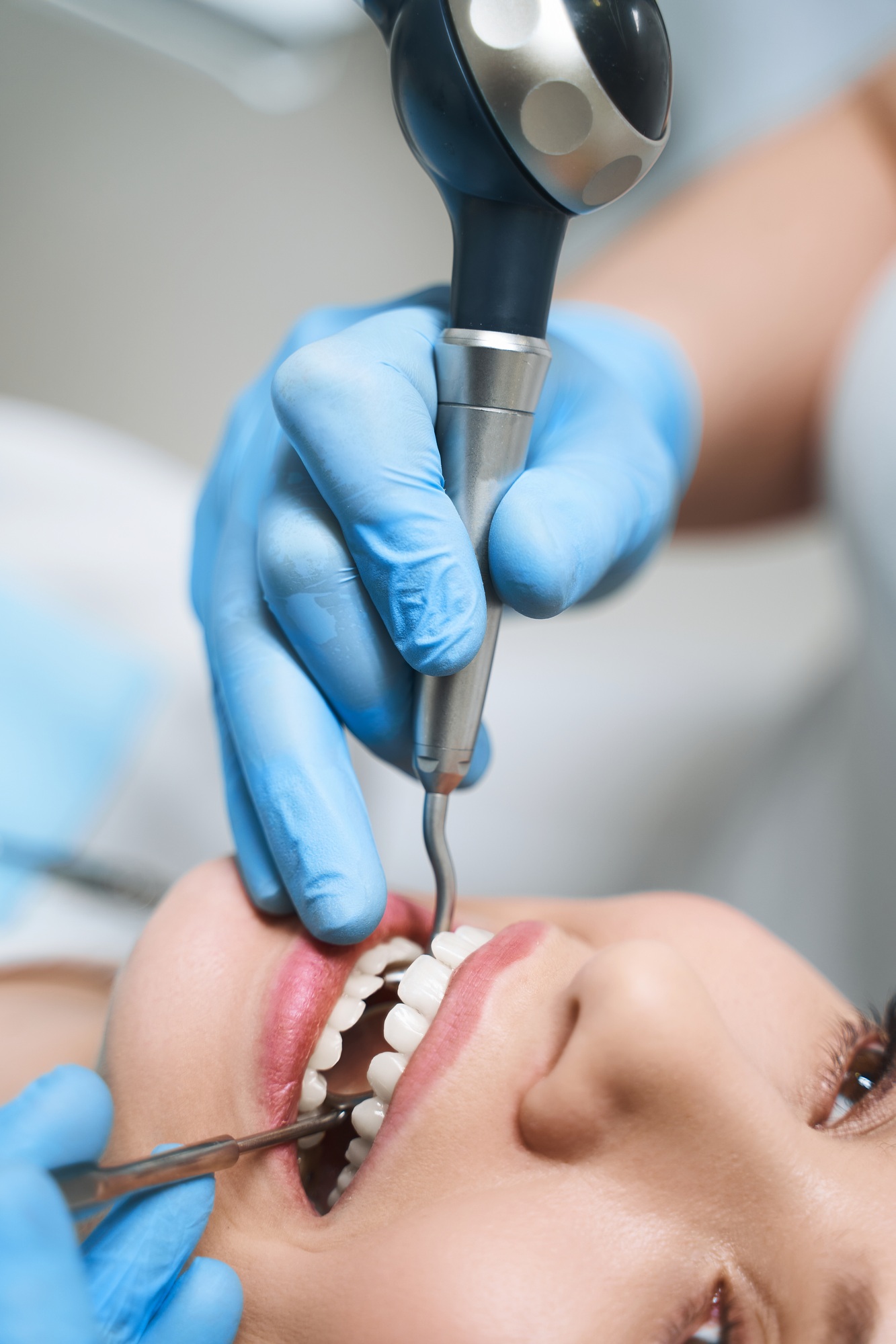 Pretty lady treating root canal stock photo